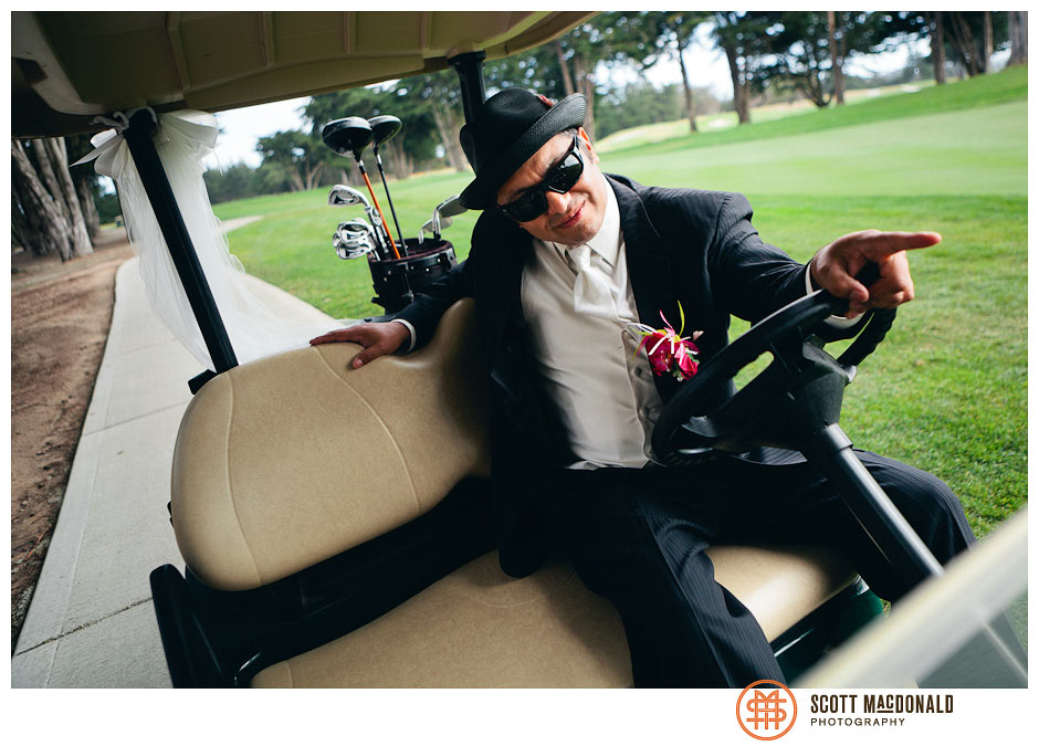 groom in a golf cart
